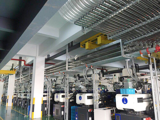 What is the conveying principle of Tongyi central feeding system?